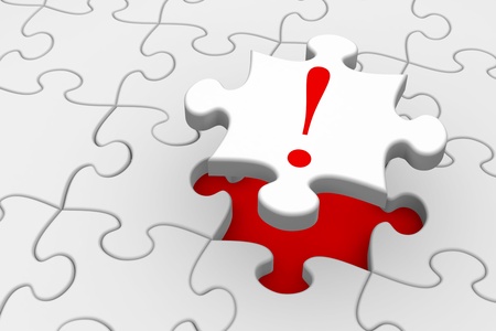Last piece of a jigsaw puzzle falling into place - solution or answer conceptの写真素材