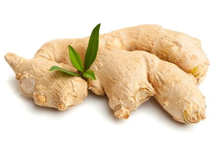 Whole fresh ginger root isolated on white backgroundの写真素材