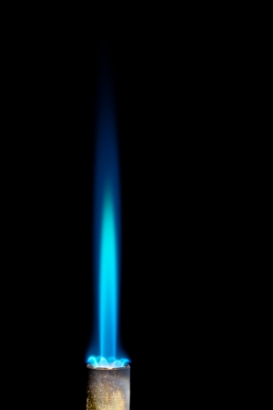 Industrial natural gas burner isolated on black backgroundの写真素材