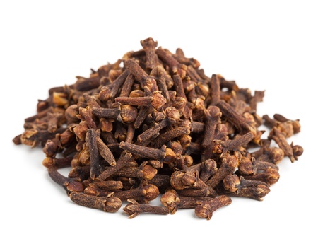 Heap of whole cloves on white backgroundの写真素材