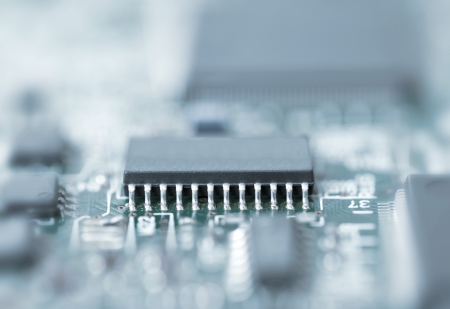 Blue toned close up microchip shot with shallow depth of fieldの写真素材