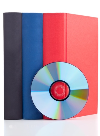 Book with compact disc over white background - e-book or digital storage conceptの写真素材