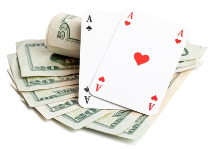 Pocket aces on dollar bills on white backgroundの写真素材