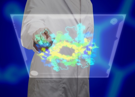 Chemistry researcher working on chemical molecular model on transparent displayの写真素材