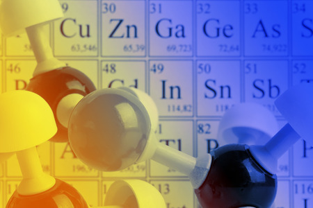 Molecule model on periodic table of the elementsの写真素材