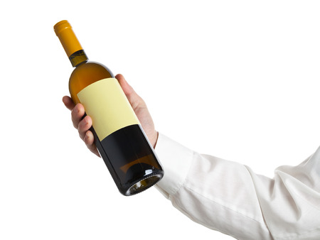 Man holding white wine bottle isolated on white backgroundの写真素材