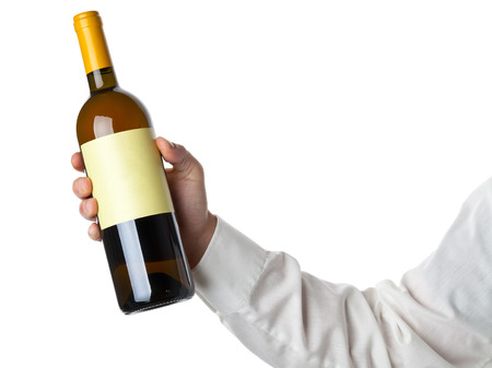 Man holding white wine bottle isolated on white backgroundの写真素材
