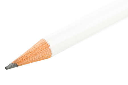 White pencil close up macro with selective focus on graphite tip isolated on white backgroundの写真素材