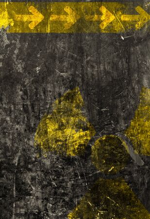 Old grunge distressed black metal plate with radiation warning symbol templateの写真素材