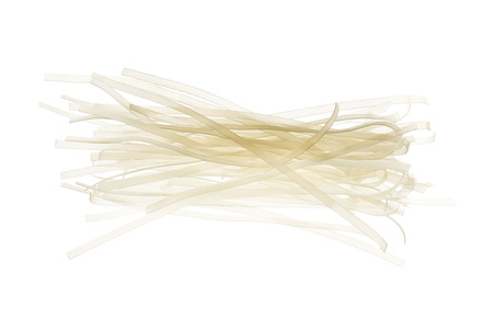 Backlit raw, uncooked, rice noodles isolated on white background