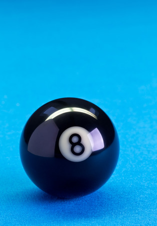 Billiard pool game eight ball on billiard table with blue cloth, copy spaceの写真素材
