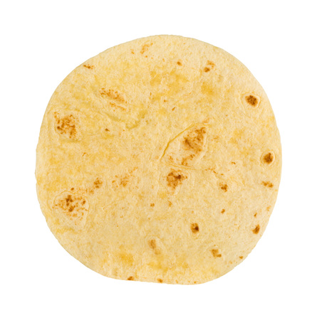 Single, empty wheat tortilla flat lay top view isolated on white backgroundの写真素材