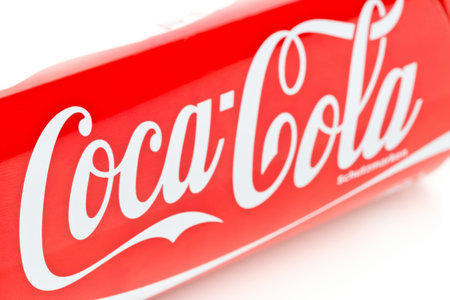 GERMANY - SEPTEMBER 25, 2019 : Coca cola logo close up on soda beverage can with selective focus over white backgroundのeditorial素材