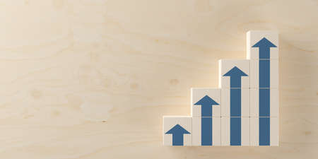 Wooden blocks with blue arrows on wooden table, business development, increase or career success...