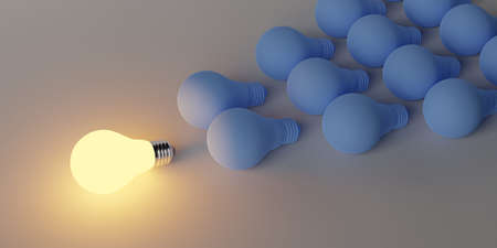 Glowing light bulb in front of group of light bulbs, leader or inspiration concept, 3D illustrationの写真素材