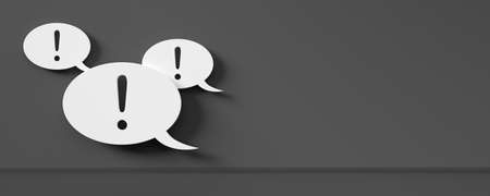 Group of white speech bubbles with exclamation marks on dark grey room background with copy space, attention or communication business concept, 3D illustrationの写真素材