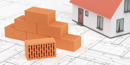 Stack of red brick stones with miniature house model on architectural building construction drawing plans background, construction or masonry or industry concept, 3D illustrationの写真素材