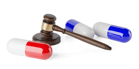 Wooden gavel, judges hammer or mallet with medical pills or capsules on white background, medical law, legal or court symbol or concept, 3D illustrationの写真素材