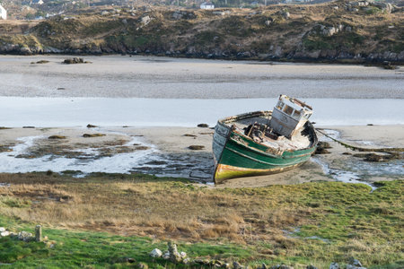 A disused fishing boat on a beach in donegal Irelandのeditorial素材