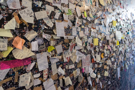 Verona, Italy - July 27, 2019:  Sentimental notes  left on the walls of the courtyard beneath Julietâs balcony in the city of Veronaのeditorial素材