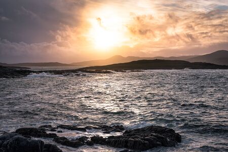 Sun going down on the coast of County Donegal in Irelandの写真素材