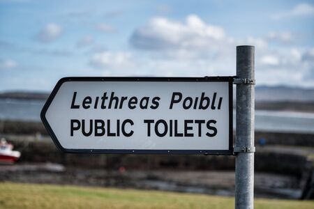 A sign in english and Irish languages for public toiletsの写真素材