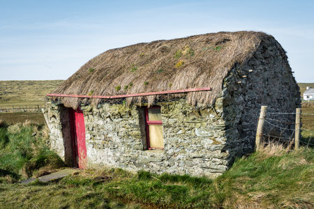Donegal, Ireland - Mar 22, 2020: This is an old abandon thatched cottage in Donegal Irelandのeditorial素材