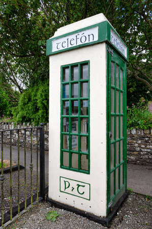 Timoleague, Ireland- July 15, 2021: An old Irish Telephone box or also known as Telefon boxのeditorial素材