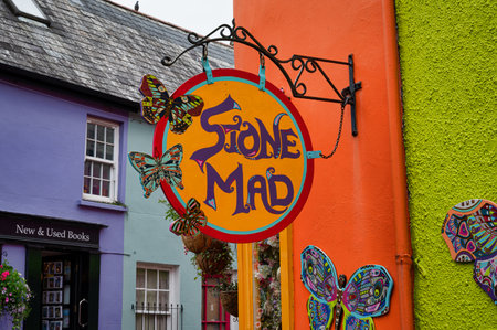 Kinsale, Ireland- July 15, 2021: The sign for Stone Mad Shop in Kinsale County Corkのeditorial素材