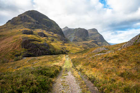 The disused old road that runs through Glencoe in the Scottish Highlandsの写真素材
