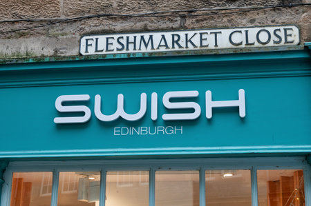 Edinburgh, Scotland- Nov 20, 2021: The sign for Swich clothing store in Edinburgh.のeditorial素材