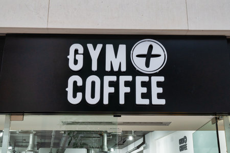 Belfast, UK- Feb 21, 2022: The Sign for Gym + Coffee in Belfast Northern Ireland.