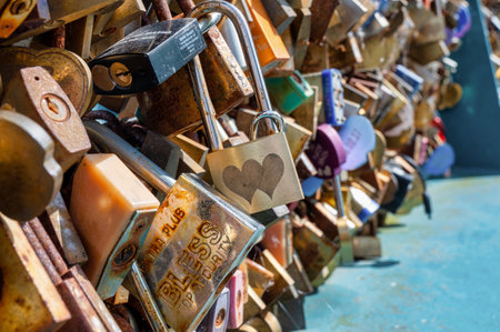 Bakewell, UK- May 15, 2022: The thousands of pad locks on the Bakewell Love Locks Bridge.