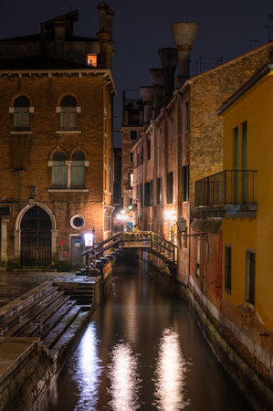 Canal in Venice at night, Italy. Long exposure shot.のeditorial素材
