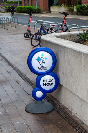 Liverpool, UK- July 18, 2025; The National Lottery play now sign  in the city of Liverpool.のeditorial素材