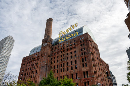 New York, USA- Oct 15, 2025;  The Domino Sugar Refinery Building in Brooklyn near the East Riverのeditorial素材
