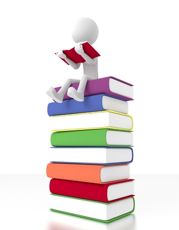 3d person sit on a pile of books reading a book.の写真素材