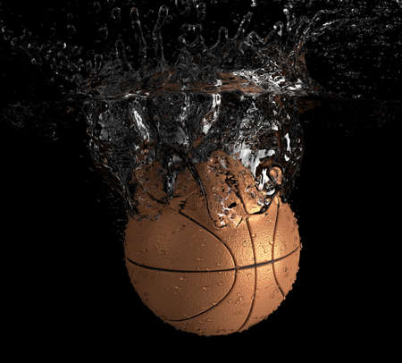 Basketball falls into waterの写真素材