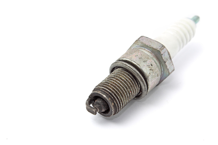 used spark plug isolated on white
