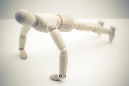 wooden dummy push-up positionの写真素材