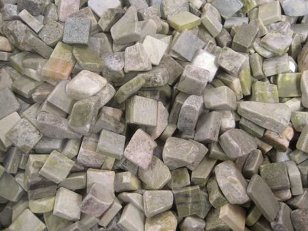Cubic marble stones in green and gray colors (background)の写真素材