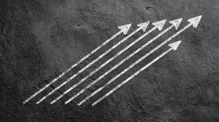 Arrow drawn on black chalkboard. Business success concept. 3D Renderingの素材