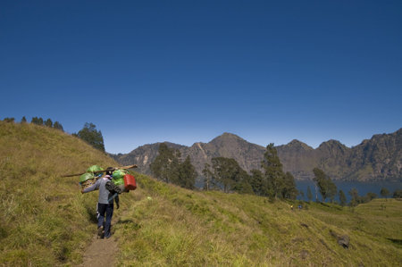 Local porter at Mount Rinjani, Lombok Island, Indonesiaの写真素材