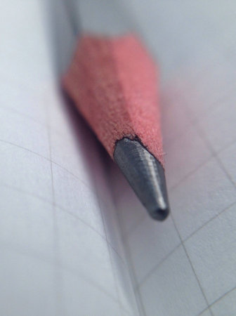 Super close up pencil with grid backgroundの素材