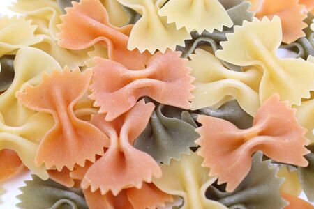 farfalle pasta on a white tableの写真素材