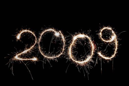 2009 written in sparkling on a black backgroundの写真素材