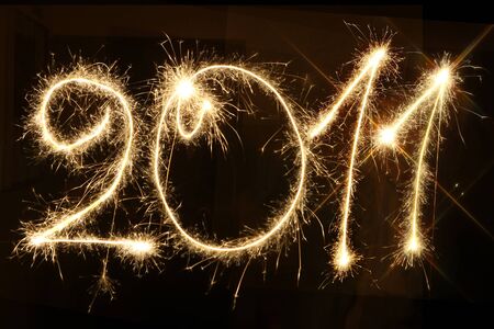 Sparkling caption 2011 - symbol of new yearの写真素材