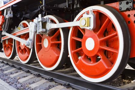 Old steam locomotive red wheels
