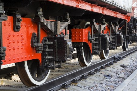Old steam locomotive red wheels