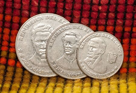 Coins of republic of Ecuador on a wool background, 25, 5, 10 centavoの写真素材
